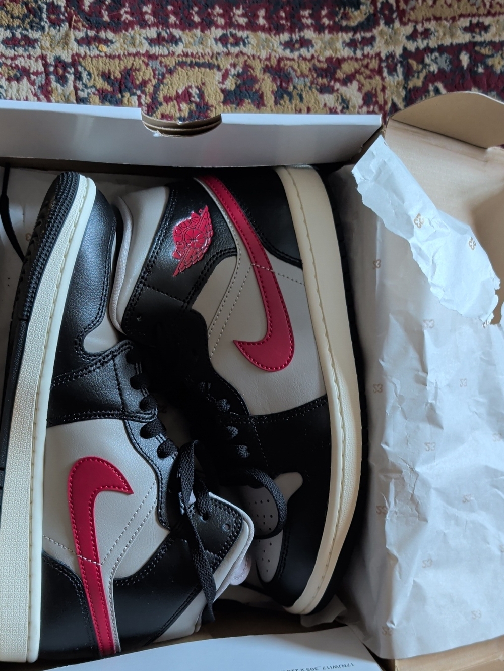 Nike Air Jordan 1 Mid in Black, White & Red